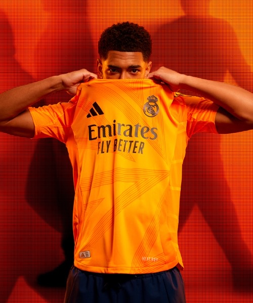 Real Madrid 2024/25 Away Jersey – Orange Edition